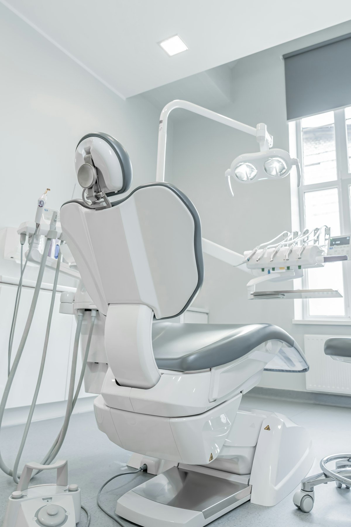 Close-up of a dental chair and overhead light