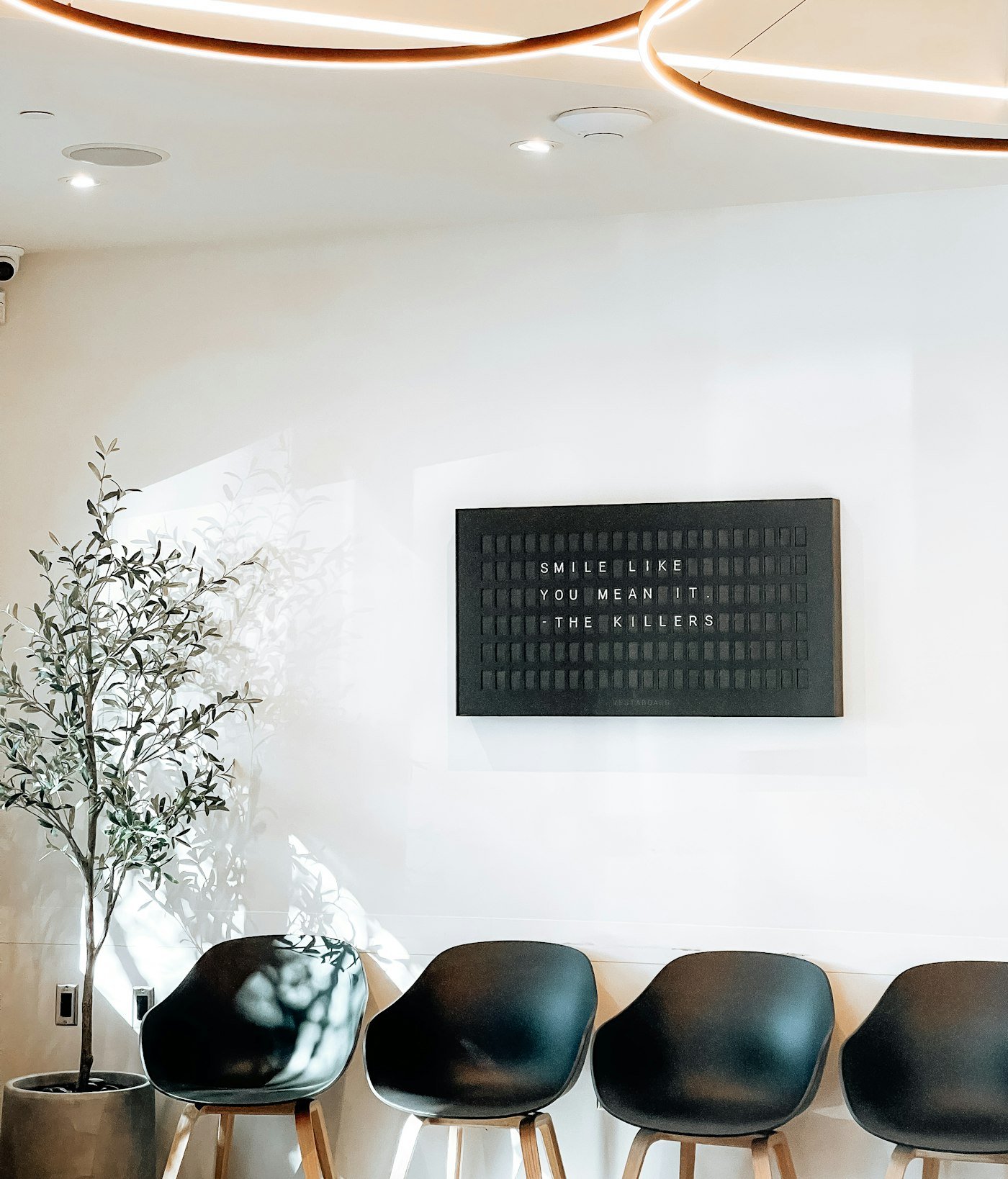 A calm waiting room with soft seating